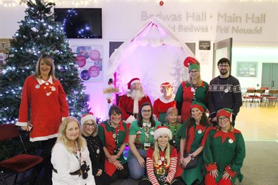 FIS Team in Santa's grotto at FIS Christmas Party event